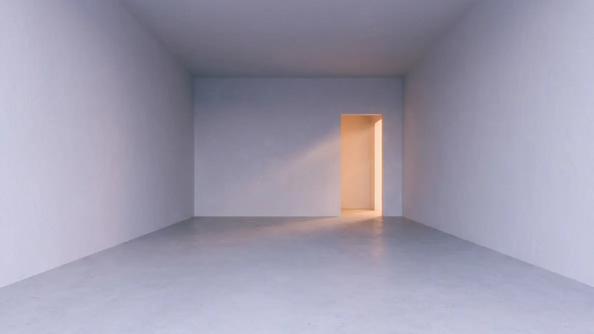 bare room with faint warm amber light beginning to emerge through an empty doorway representing inner reorientation after spiritual emptiness