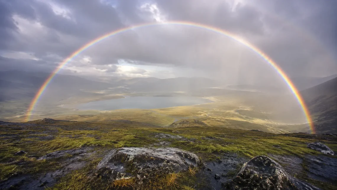 rainbow appearing in a clearing post-rain sky, representing seeing a rainbow after praying meaning