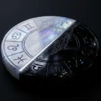 astrological wheel showing the shadow side of your zodiac sign in light and shadow