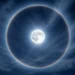 Moon halo meaning illustrated with ice crystals and a luminous ring around the Moon