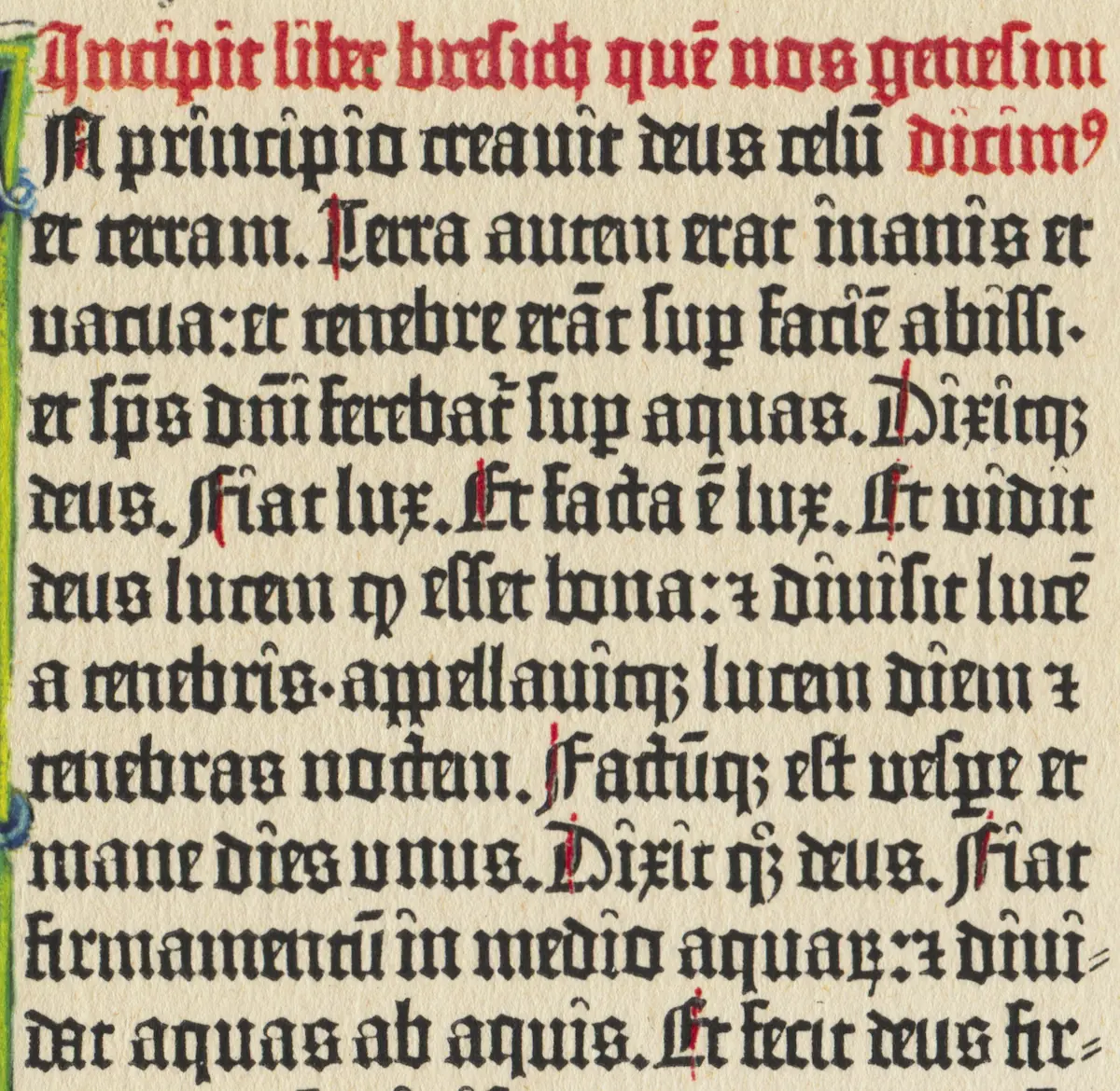 Opening lines of the Book of Genesis in black Gothic type with red rubrics in the Gutenberg Bible